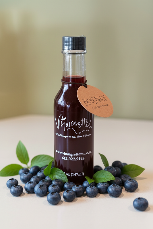 Blueberry Vinegar Styled with Green Leaves